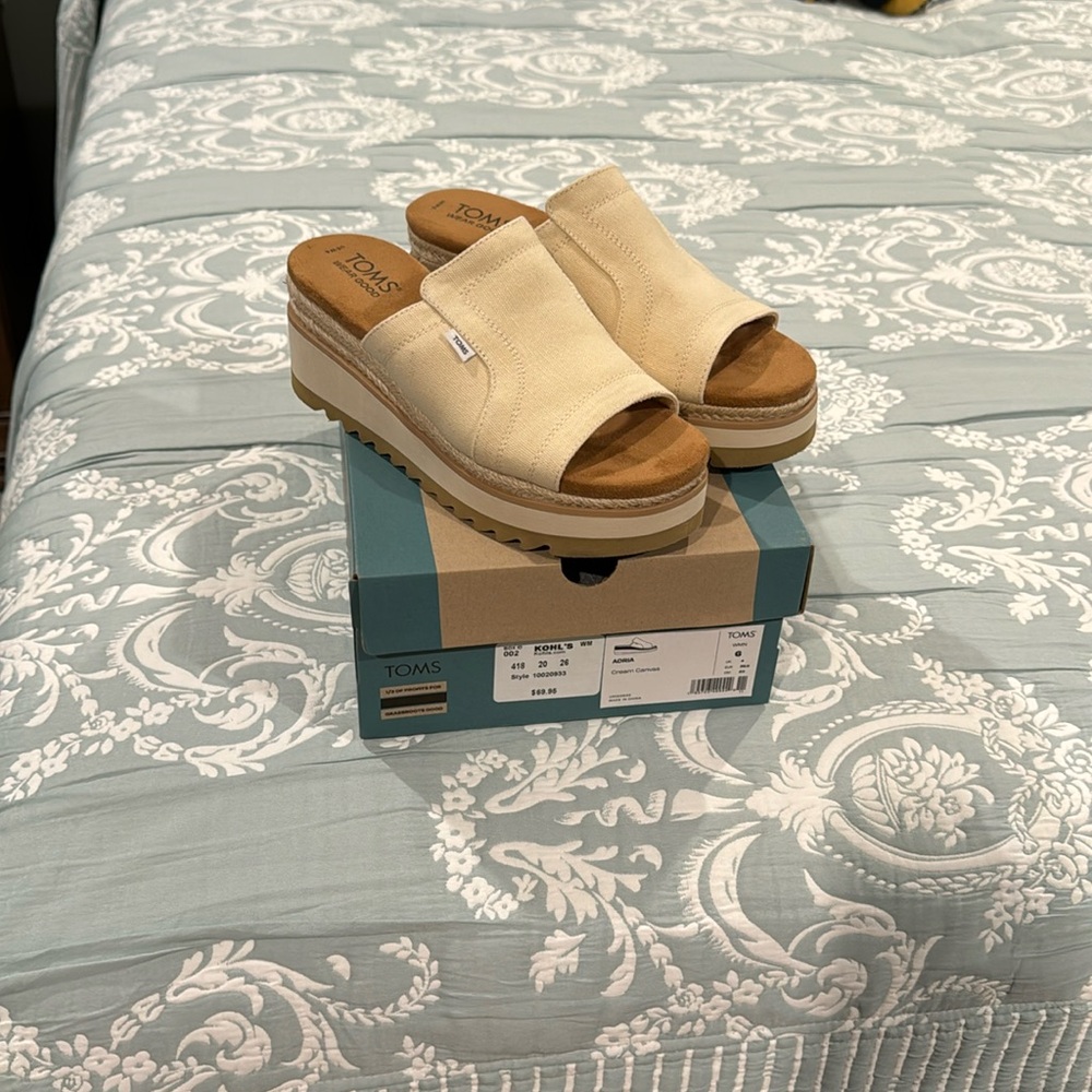 Gorgeous cream sandals by Toms.